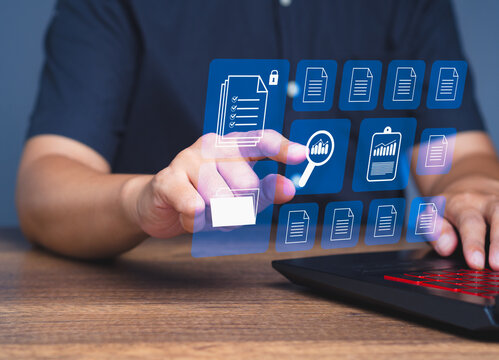 Touching virtual data folders and graphs on digital display, modern technology concept.