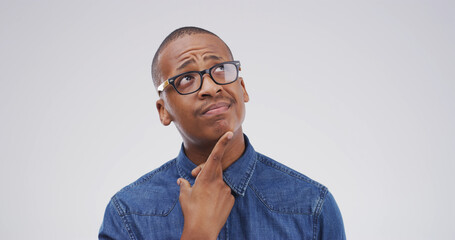 Idea, question and why with black man on studio space for brainstorming, contemplation or solution....