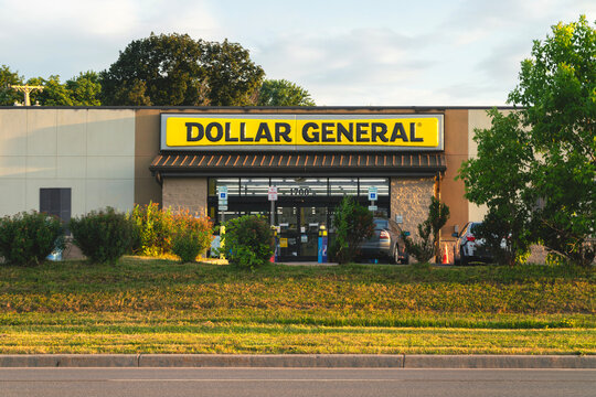 Utica, NY - Jul 12, 2025: Wide view of Dollar General store, is a popular discount retailer providing a wide range of everyday essentials, was established in 1939 with over 18000 now
