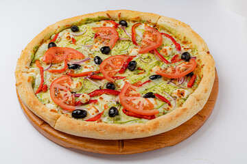 A vibrant pizza featuring tomatoes, olives, and peppers, set on a wooden serving board