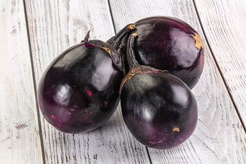 Raw violet and black eggplant