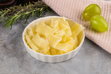 Parmesan cheese slices in the bowl