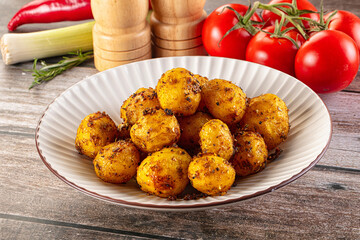 Baked small baby potato with herbs