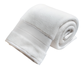 White towel rolled up neatly on a plain background ready for use or display in bathrooms or spas