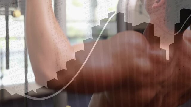 Male athlete gripping pulldown bar and pulling down in gym with chart tracking strength in workout