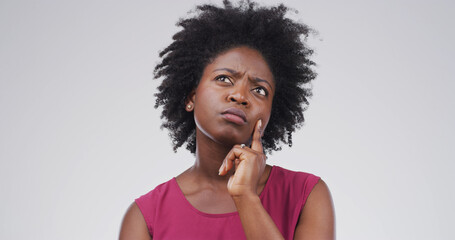 Thinking, decision and black woman in studio with uncertain for ideas, brainstorming or question....