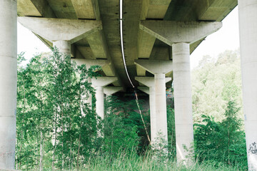 The underneath of a large concrete bridge in Sweden