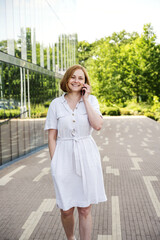 Technology, communication, lifestyle - woman  calling on smartphone