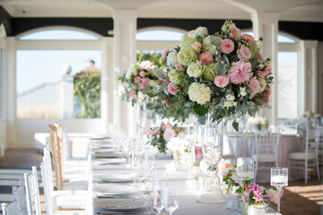 Elegant Wedding Table Setting with Floral Centerpieces and Candl