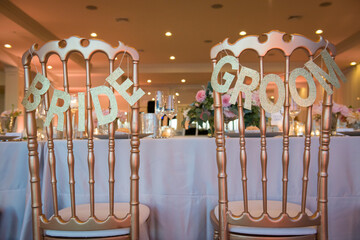 Bride and Groom Chair Signs at Wedding Reception
