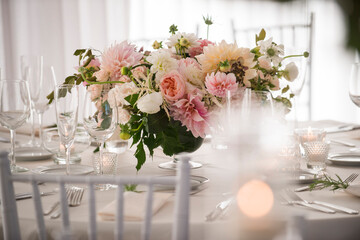 Low Floral Centerpiece with Candles on Elegant Wedding Table