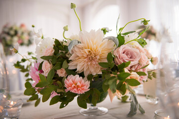 Close-Up of Lush Floral Wedding Centerpiece with Dahlias and Ros