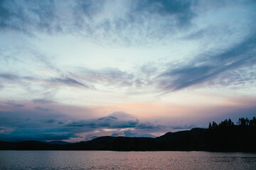 Hotagen sunset reflecting on the lake: pink and purple cloudscap