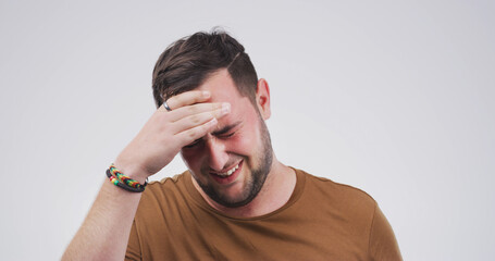 Man, headache and stress with pain in studio with mockup space, fatigue or vertigo on white...