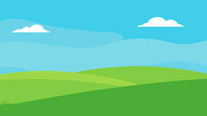 Mountain landscape with green meadows, blue sky, and white clouds