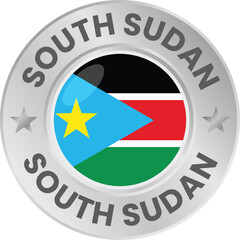 South Sudan flag in silver colored medal. National flag in metal circle emblem.