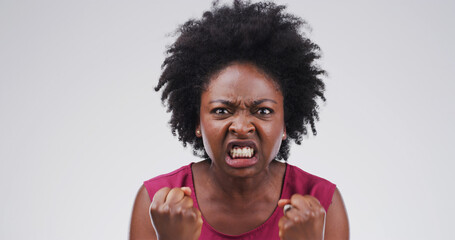 Scream, angry and portrait of black woman in studio with frustrated, stress and mistake on white...