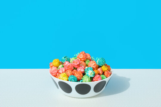 Bowl fo Caramel Corn with Blue Background