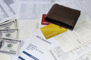 credit card and many unpaid bills with bank statement and savings book balance is not enough to pay