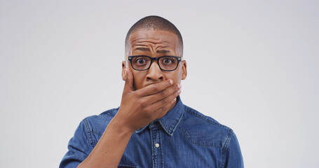 Portrait, shocked and man with facial expression for gossip, studio or amazed by revelation or...