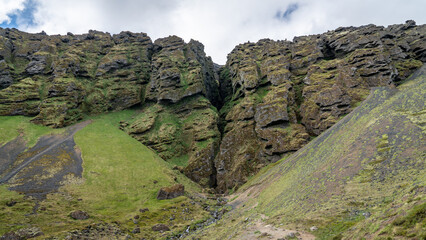 Rauofeldsgja ravine on Snaefellsbaer Peninsula, surrounded by rugged volcanic cliffs and pristine natural beauty in Iceland.