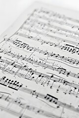 ia generated. Artistic design with swirling musical notes on white background, perfect for music, creativity, or editorial design themes.
