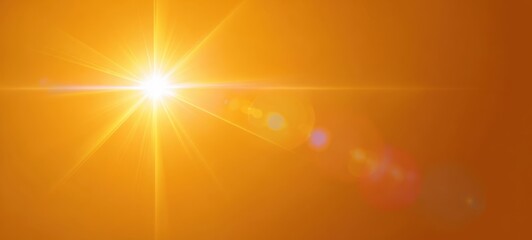 The radiant sun illuminating a warm orange sky at twilight