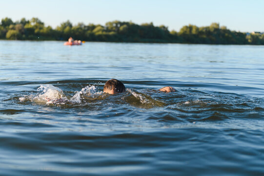 Child drowning in river during summer vacation, preventing water accidents