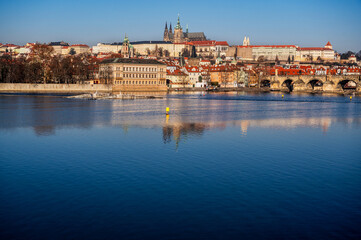 Panorama of Prague castle, historical building and Charles bridge with river Vltava.