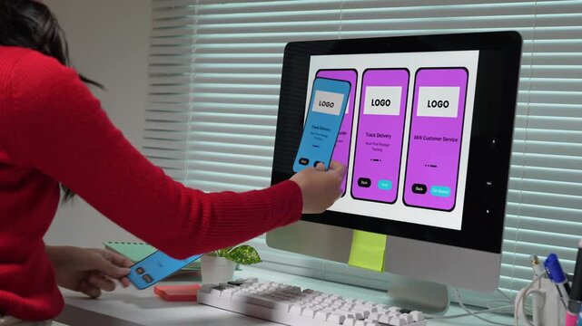Woman software developer designing mobile application interface