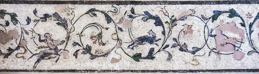 Fragment of Roman mosaic ornament with floral and animal motifs from ancient Corinth, Greece