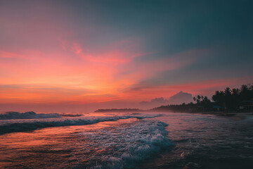 Obraz premium breathtaking summer sunset over serene ocean painting sky in vibrant hues of orange pink and purple