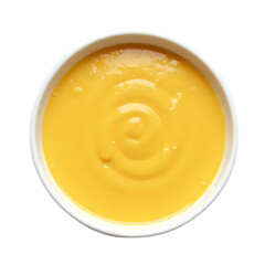 A white bowl filled with yellow corn chowder close up isolated on transparent background