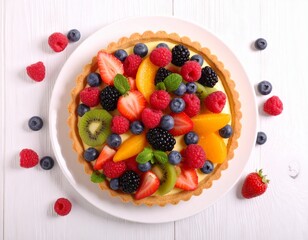 Colorful Fresh Fruit Tart with Assorted Berries, Kiwi, Mango and Mint Garnish on White Wooden Background