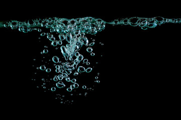 blue water bubble liquid abstract isolated black background. Concept of designing oxygen air underwater, the effect of soda transparent. texture drop small under the sea. bubble in water