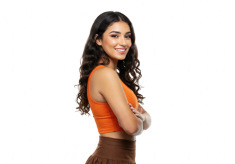 A young woman with dark curly hair smiles confidently with her arms crossed, looking to the side isolated on transparent background