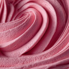 Ultra quality image of pink frosting swirl close up macro shot of dessert topping texture for cake decorating and sweet treat design element.