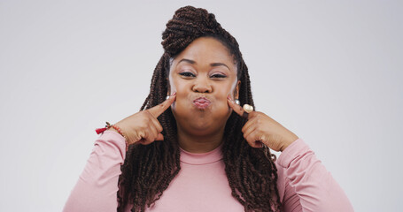 Silly, portrait or woman with funny face, facial expression or gesture for humor, studio and comic....
