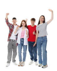 Obraz premium Excited teenagers posing together on white background