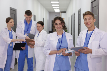 Fototapeta premium Group of medical students in uniforms indoors