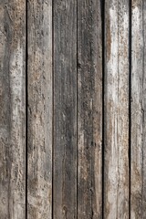 Fototapeta premium Weathered Wood Slats Create a Rustic Background With Unique Texture and Charm for Design or Crafts