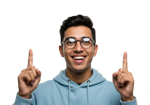 A young man with dark hair and glasses, smiling and pointing upwards with both index fingers, isolated on a transparent background
