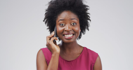 Portrait, phone call and black woman in studio, good news and discussion on white background....