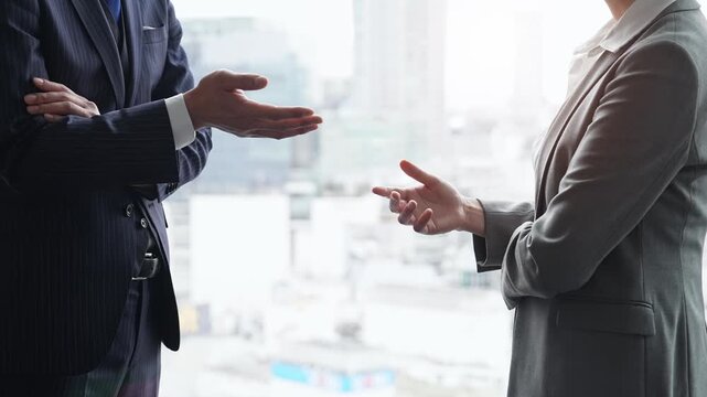 Group of business people having a conversation in an office