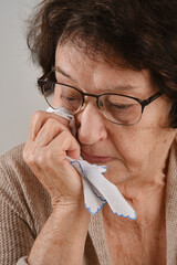 Grandmother with a handkerchief.  Selective focus