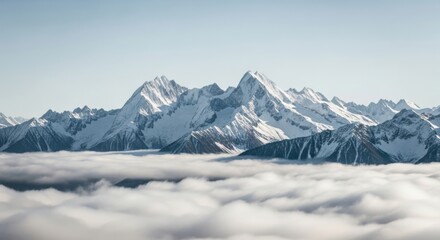 Fototapeta premium Aerial vista of majestic mountains piercing through a sea of fluffy clouds