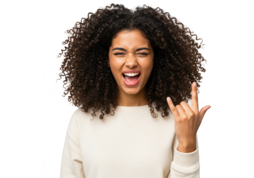 Young woman with curly hair making a rock and roll hand gesture and winking, isolated on transparent background
