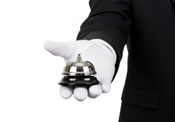 A gloved hand of a hotel bellhop holding a silver service bell for assistance isolated on transparent background