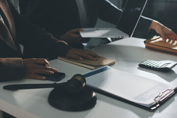 Lawyer explained to the client about the law that must be brought against the court case.