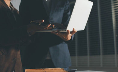 Fototapeta premium Lawyer explained to the client about the law that must be brought against the court case.